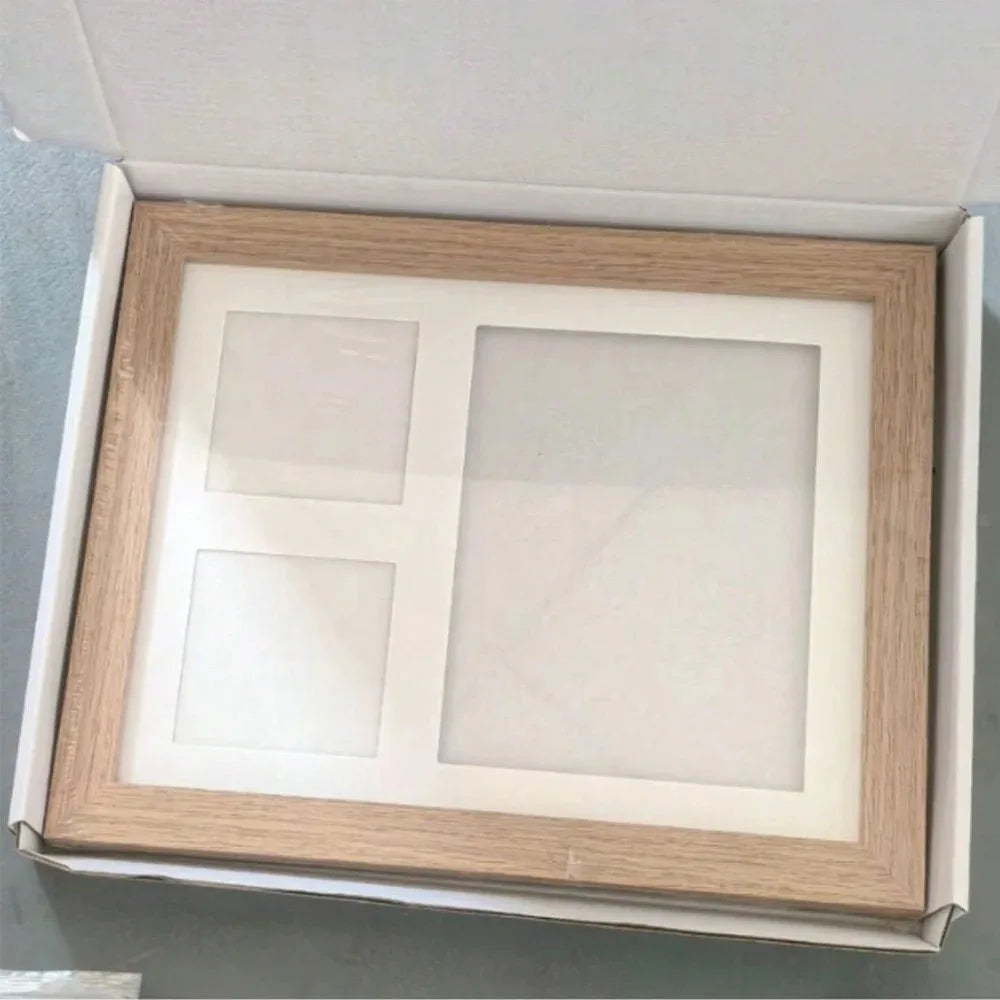 Marco de madera en su caja de regalo