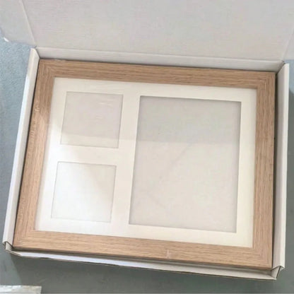 Marco de madera en su caja de regalo